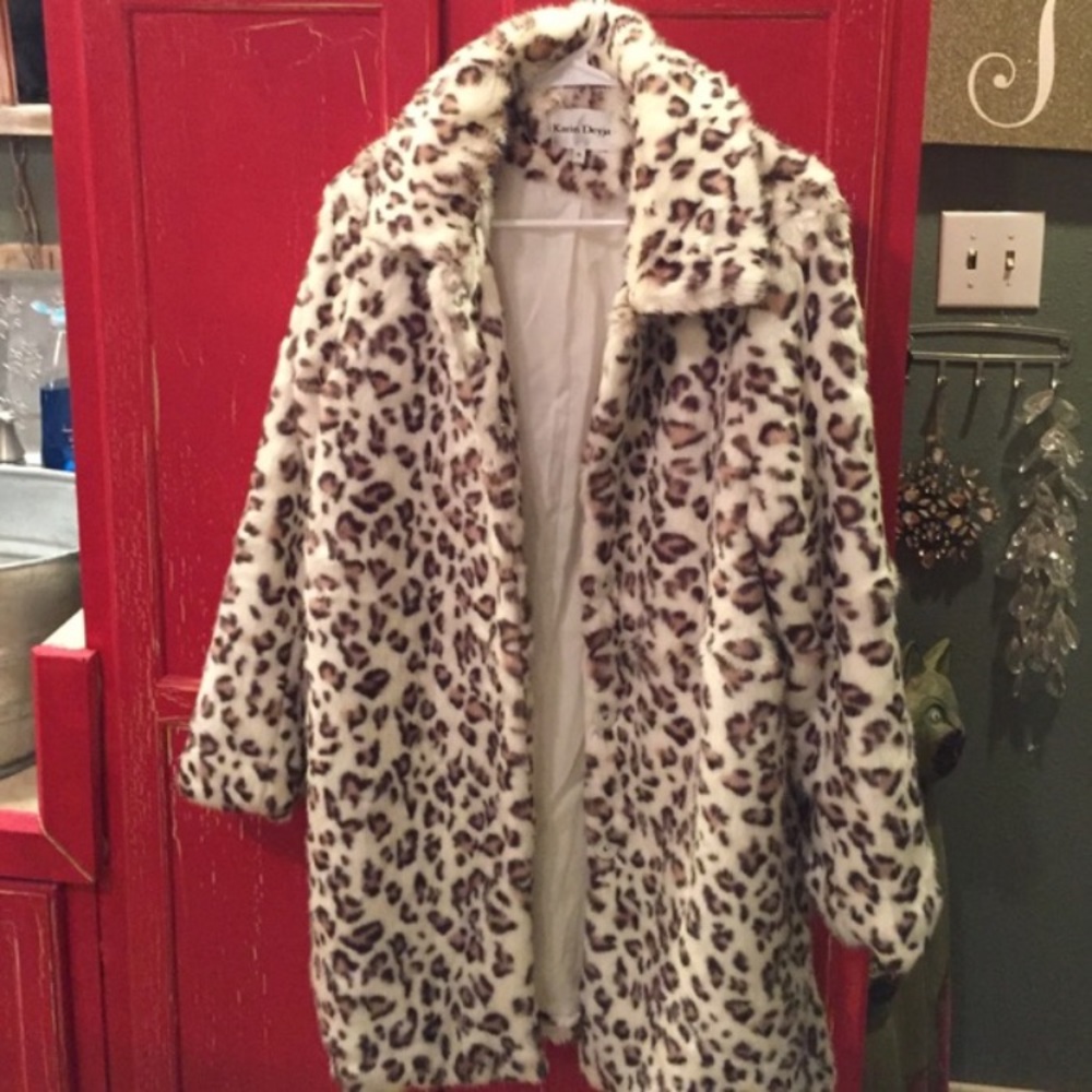 White leopard fur coat